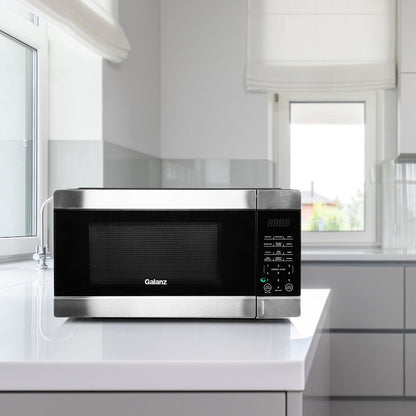 Four à micro-ondes de comptoir noir de 0,9 pi³ et 900 W avec cuisson express à une touche