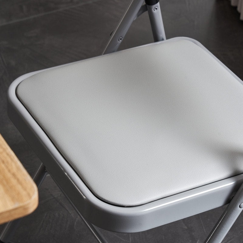 Chaises élégantes pliables en fer et PVC blanc pour congrès et expositions