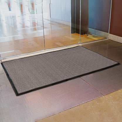 Tapis d'entrée Envelor pour intérieur et extérieur, profil bas, usage commercial.