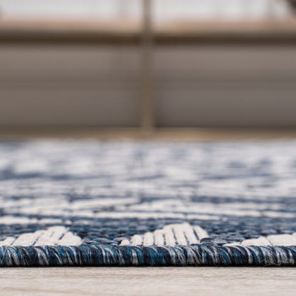 JONATHAN Y Tapis intérieur/extérieur à fronde de palmier Galon