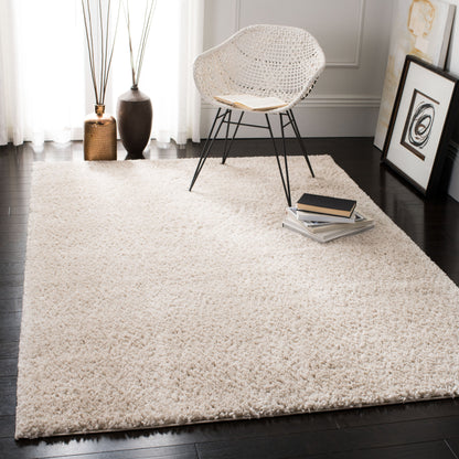 Tapis SAFAVIEH August Wilhelma Shag uni de 3 cm d'épaisseur