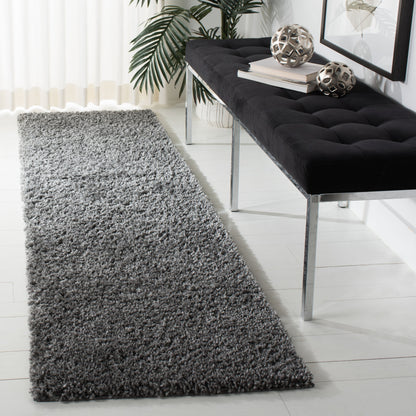 Tapis SAFAVIEH August Wilhelma Shag uni de 3 cm d'épaisseur