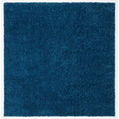 Tapis SAFAVIEH August Wilhelma Shag uni de 3 cm d'épaisseur