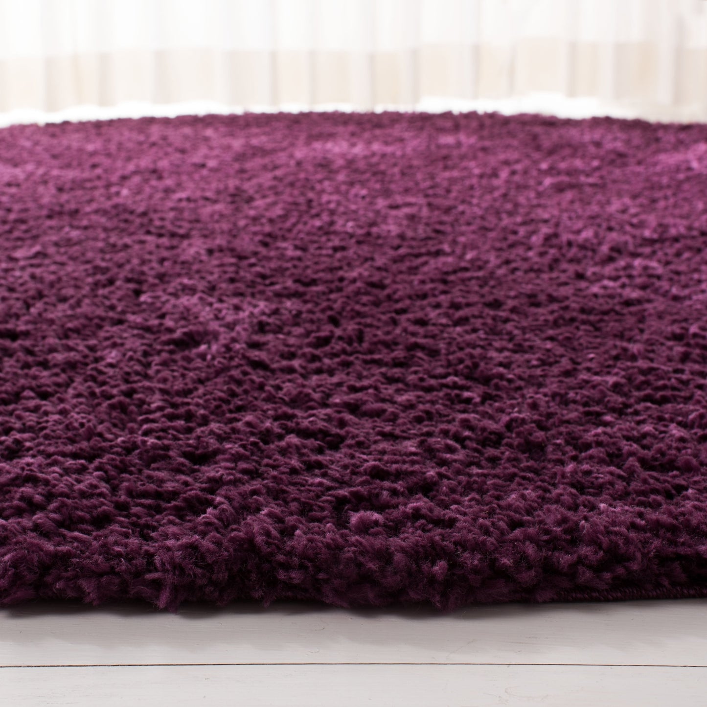 Tapis SAFAVIEH August Wilhelma Shag uni de 3 cm d'épaisseur