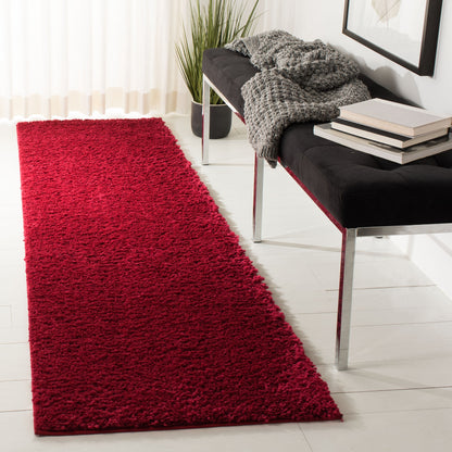Tapis SAFAVIEH August Wilhelma Shag uni de 3 cm d'épaisseur