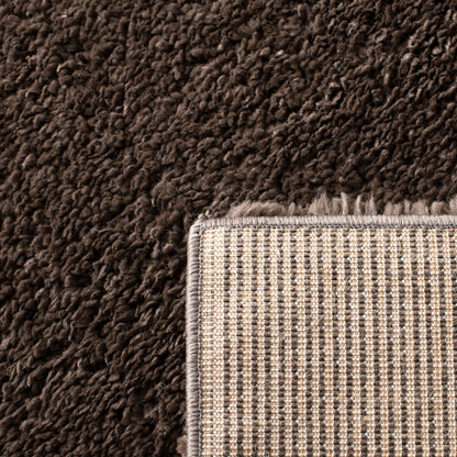 Tapis SAFAVIEH August Wilhelma Shag uni de 3 cm d'épaisseur