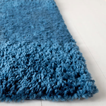 Tapis SAFAVIEH August Wilhelma Shag uni de 3 cm d'épaisseur