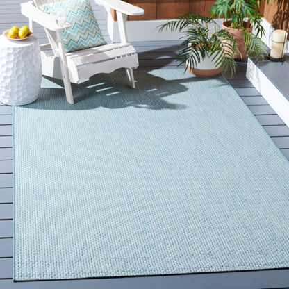 Tapis de patio/jardin imperméable SAFAVIEH Courtyard Begajeta pour intérieur/extérieur.