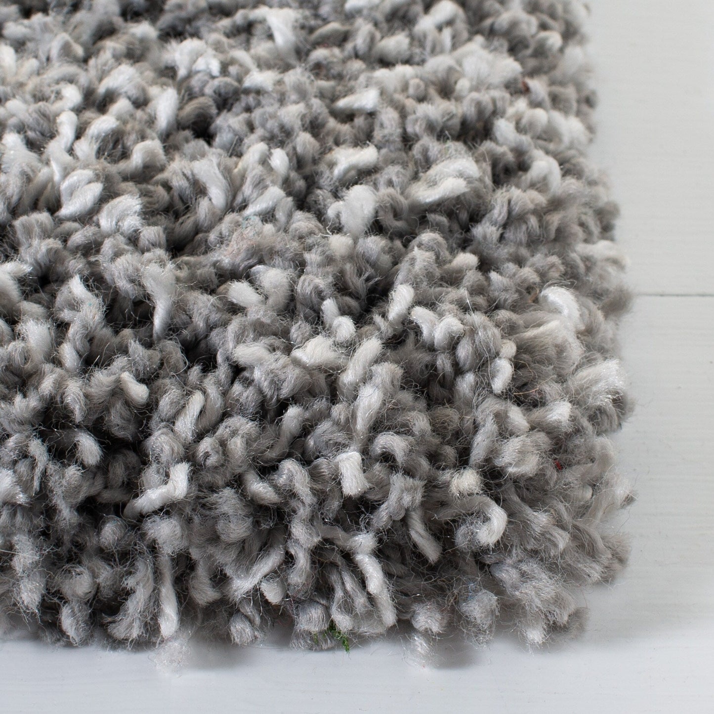 Tapis SAFAVIEH Evolution Shag Fransien uni de 4,6 cm d'épaisseur