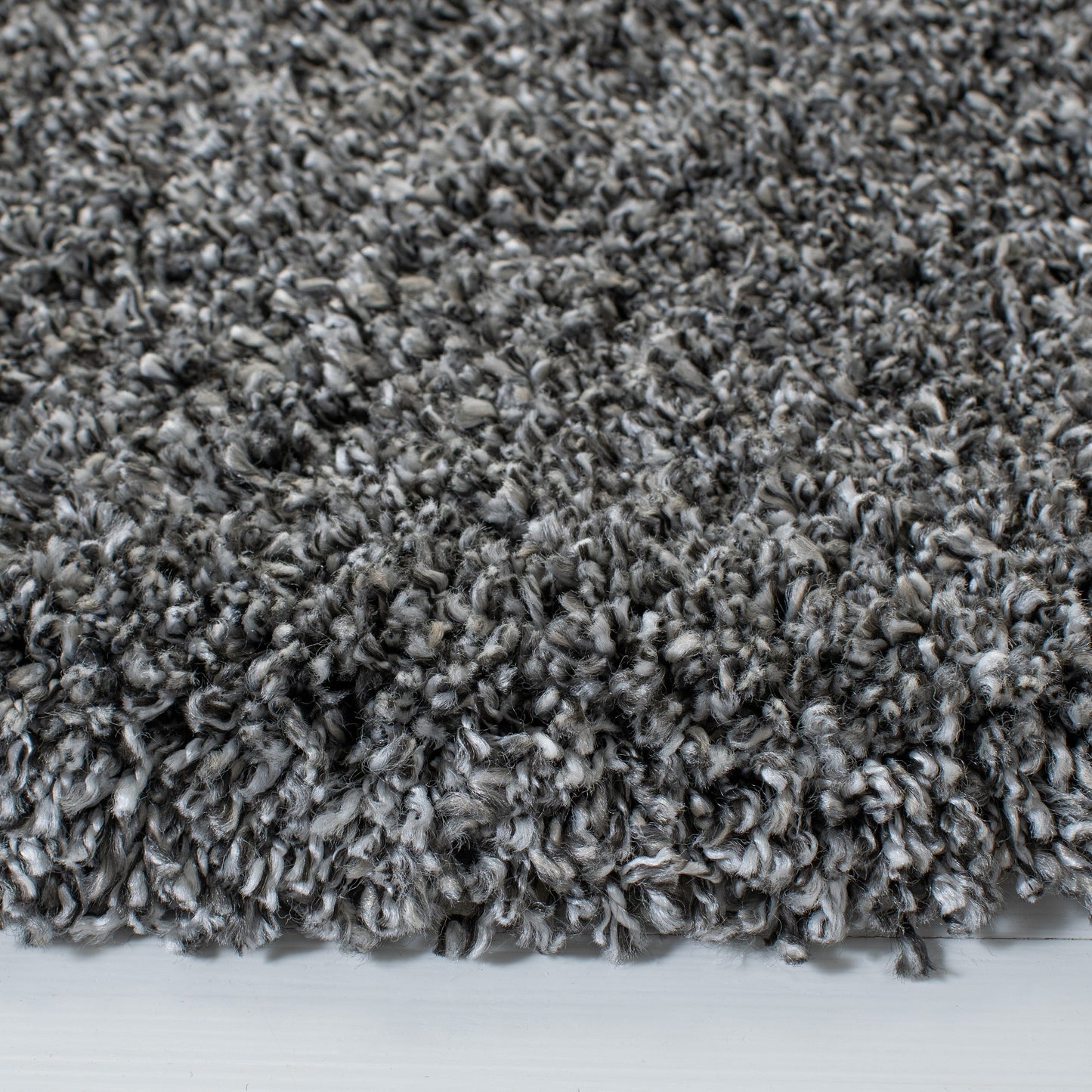 Tapis SAFAVIEH Evolution Shag Fransien uni de 4,6 cm d'épaisseur