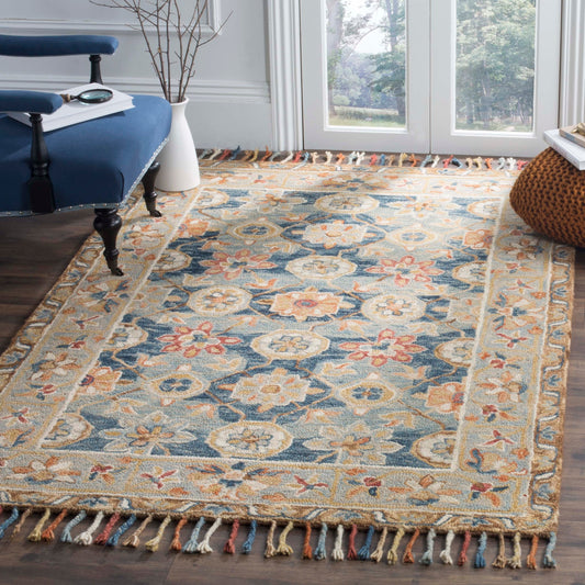 Tapis en laine à pompons Aspen Kimm Boho fait main SAFAVIEH