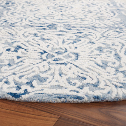 Tapis en laine moderne à motif floral Gertrida, fait main par SAFAVIEH