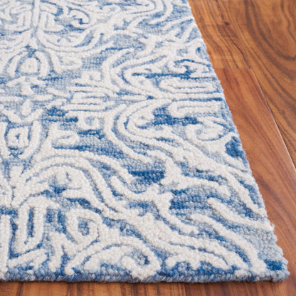 Tapis en laine moderne à motif floral Gertrida, fait main par SAFAVIEH