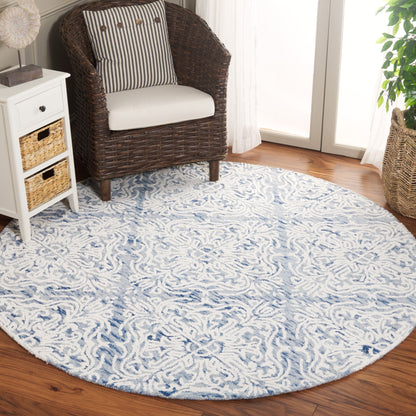 Tapis en laine moderne à motif floral Gertrida, fait main par SAFAVIEH