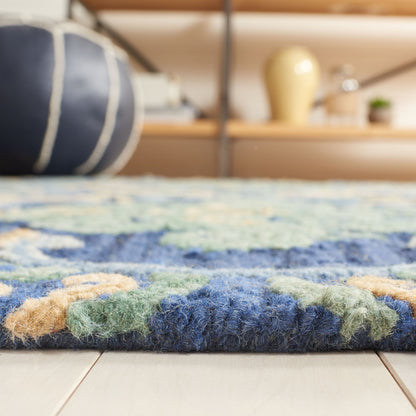 Tapis en laine à motif floral Porzia fait main SAFAVIEH