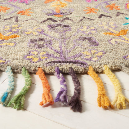 Tapis en laine moderne à motif floral Takuko fait main SAFAVIEH