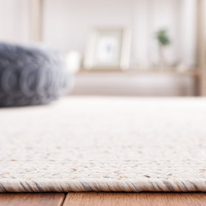 Tapis décontracté tressé à la main SAFAVIEH Anthi