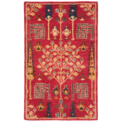 Tapis oriental traditionnel en laine SAFAVIEH fait main, motif floral, style classique.