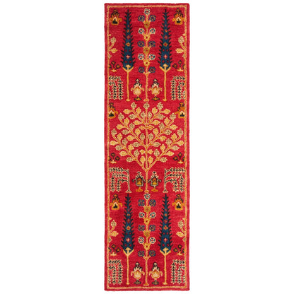 Tapis oriental traditionnel en laine SAFAVIEH fait main, motif floral, style classique.