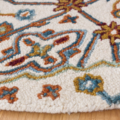 Tapis en laine à motif floral Snjolaug fait main SAFAVIEH Heritage