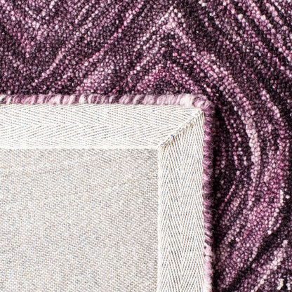 SAFAVIEH Tapis en laine Ikat Lilija fait main