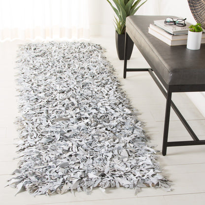 SAFAVIEH Tapis en cuir moderne à poils longs Blayne fait à la main