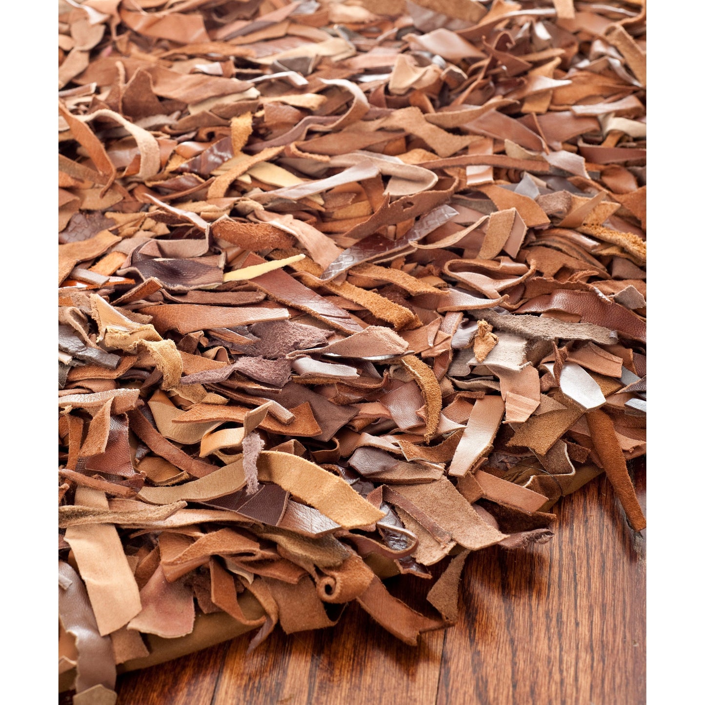 Tapis décoratif moderne SAFAVIEH en cuir shaggy fait main Doinita