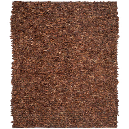 Tapis décoratif moderne SAFAVIEH en cuir shaggy fait main Doinita