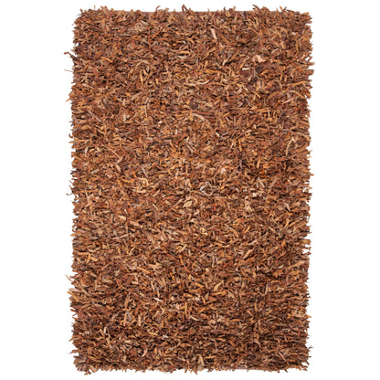 Tapis décoratif moderne SAFAVIEH en cuir shaggy fait main Doinita