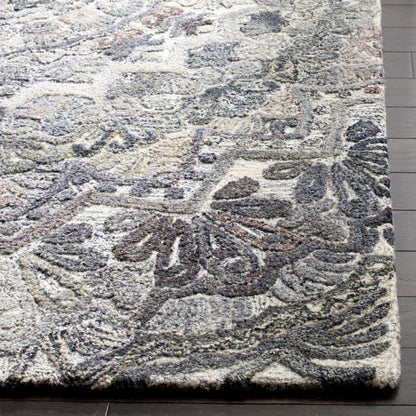 SAFAVIEH Tapis en laine à médaillon moderne Carlijn fait à la main