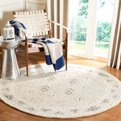 Tapis SAFAVIEH en laine Lutetia micro-bouclée faite à la main