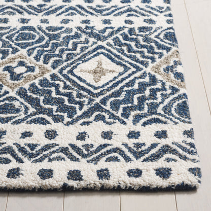 Tapis SAFAVIEH en laine Lutetia micro-bouclée faite à la main