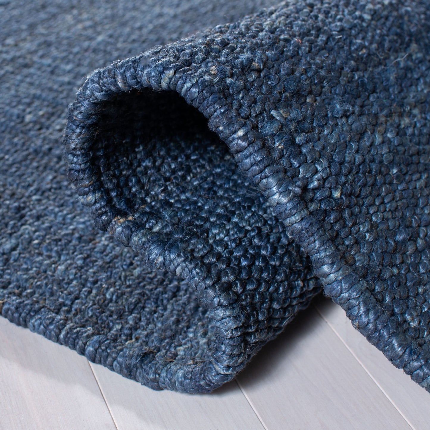 Tapis à franges en jute Eybjorg en fibres naturelles fait main SAFAVIEH