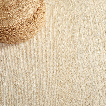 Tapis rond en jute à bordure Jolette en fibres naturelles fait main SAFAVIEH