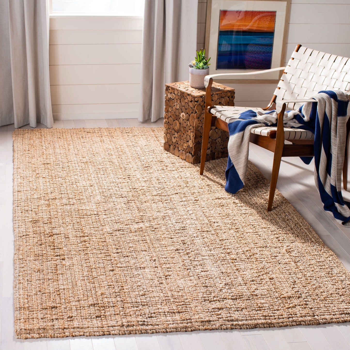 Tapis SAFAVIEH Nihada décontracté en fibre naturelle faite à la main, en jute unie.