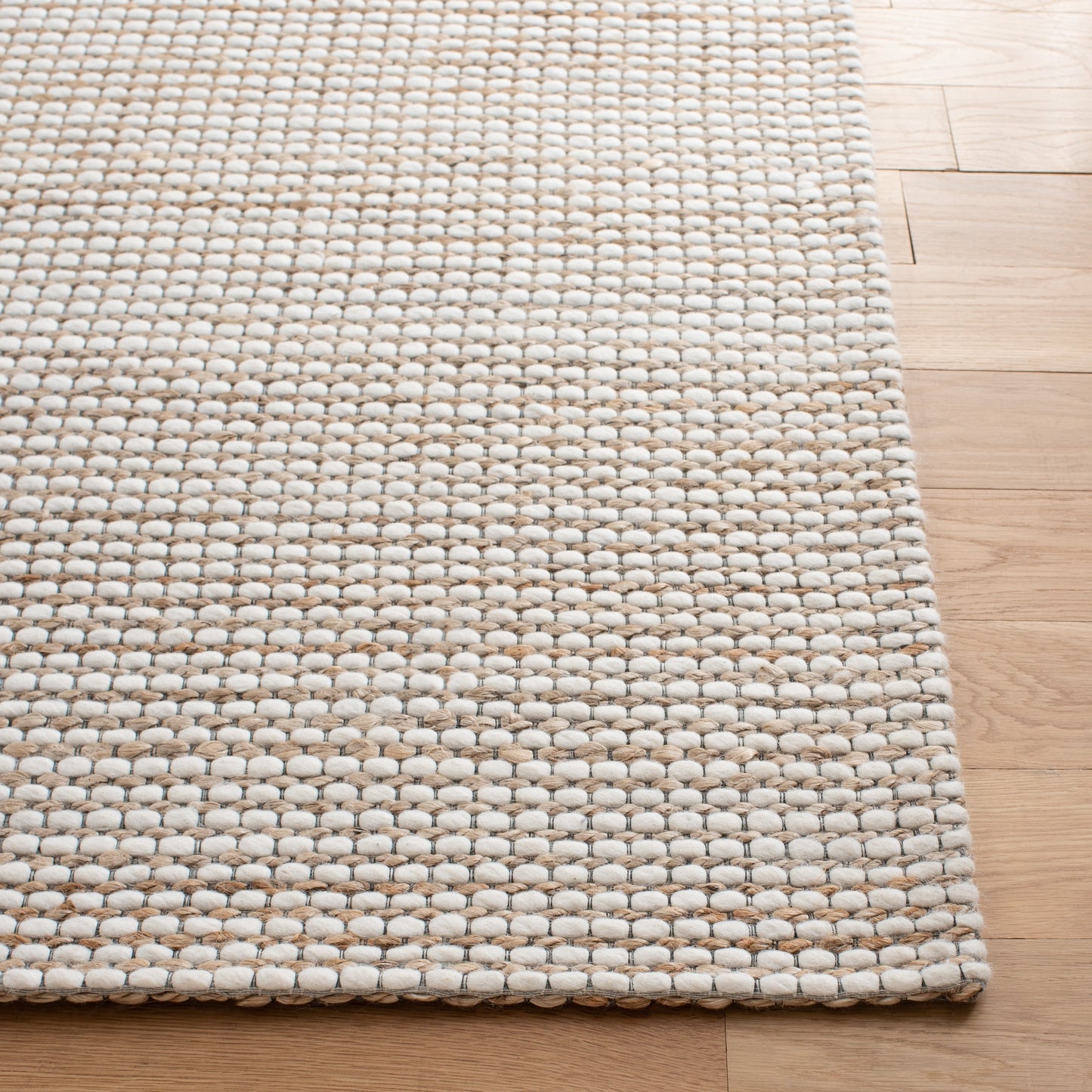 Tapis SAFAVIEH fait main en fibres naturelles Yareli, jute et laine.