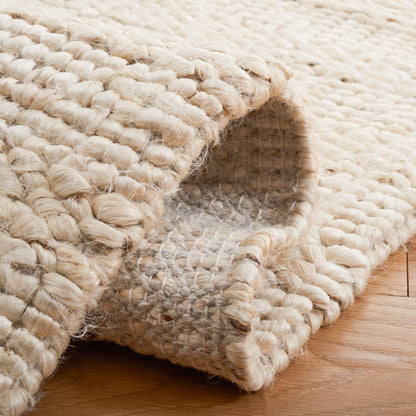 SAFAVIEH Tapis en jute Zaniyah en fibre naturelle fait à la main