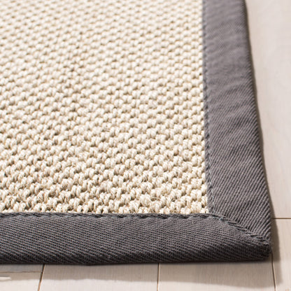 Tapis en sisal Lorine à bordure décontractée en fibres naturelles SAFAVIEH