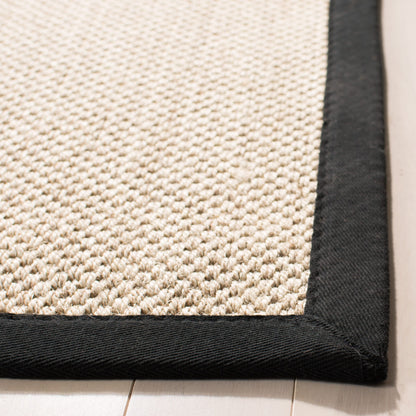 Tapis en sisal Lorine à bordure décontractée en fibres naturelles SAFAVIEH