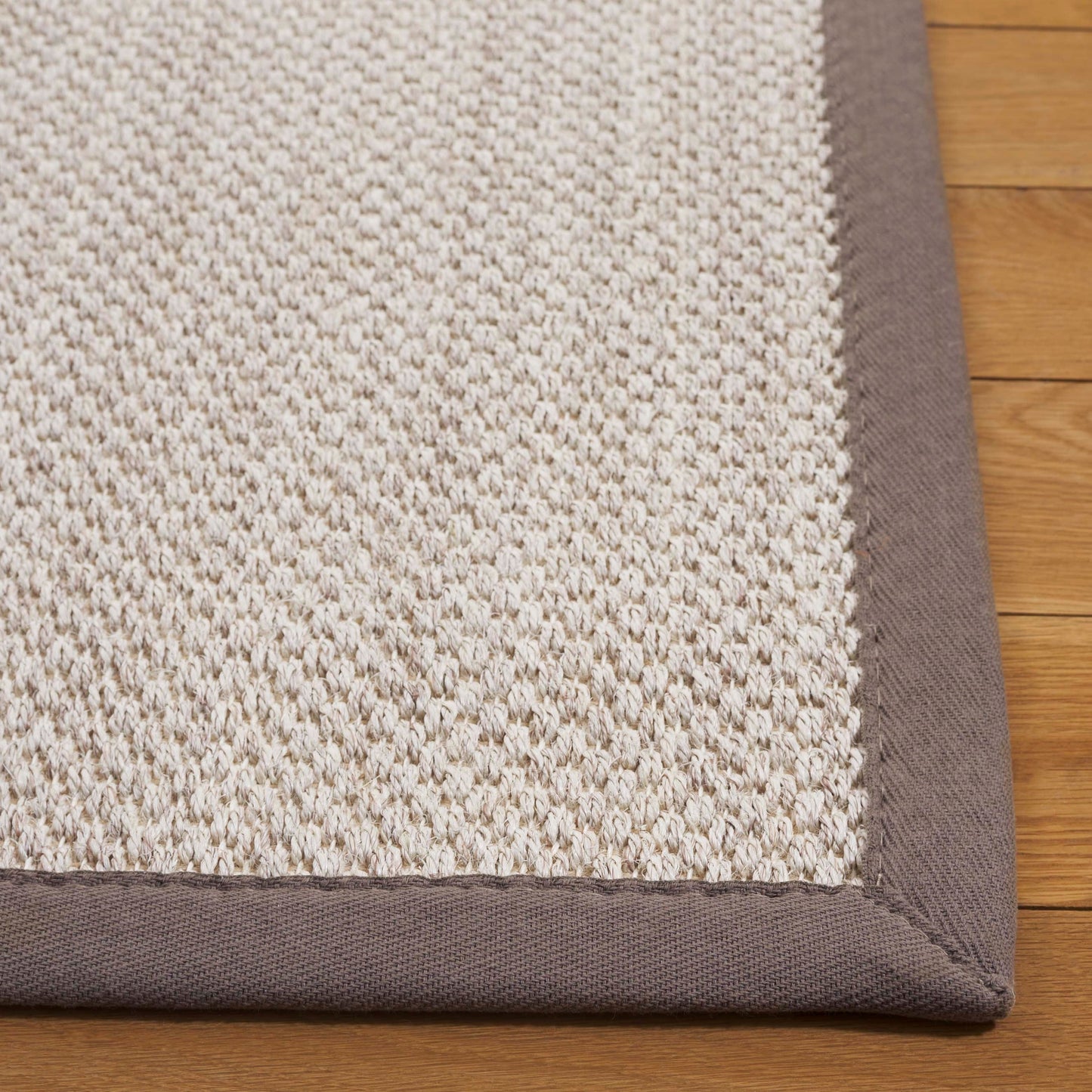 Tapis en sisal Lorine à bordure décontractée en fibres naturelles SAFAVIEH