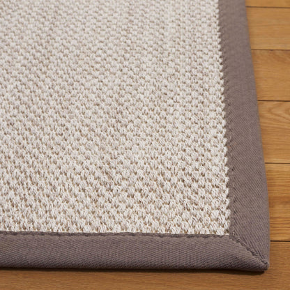 Tapis en sisal Lorine à bordure décontractée en fibres naturelles SAFAVIEH