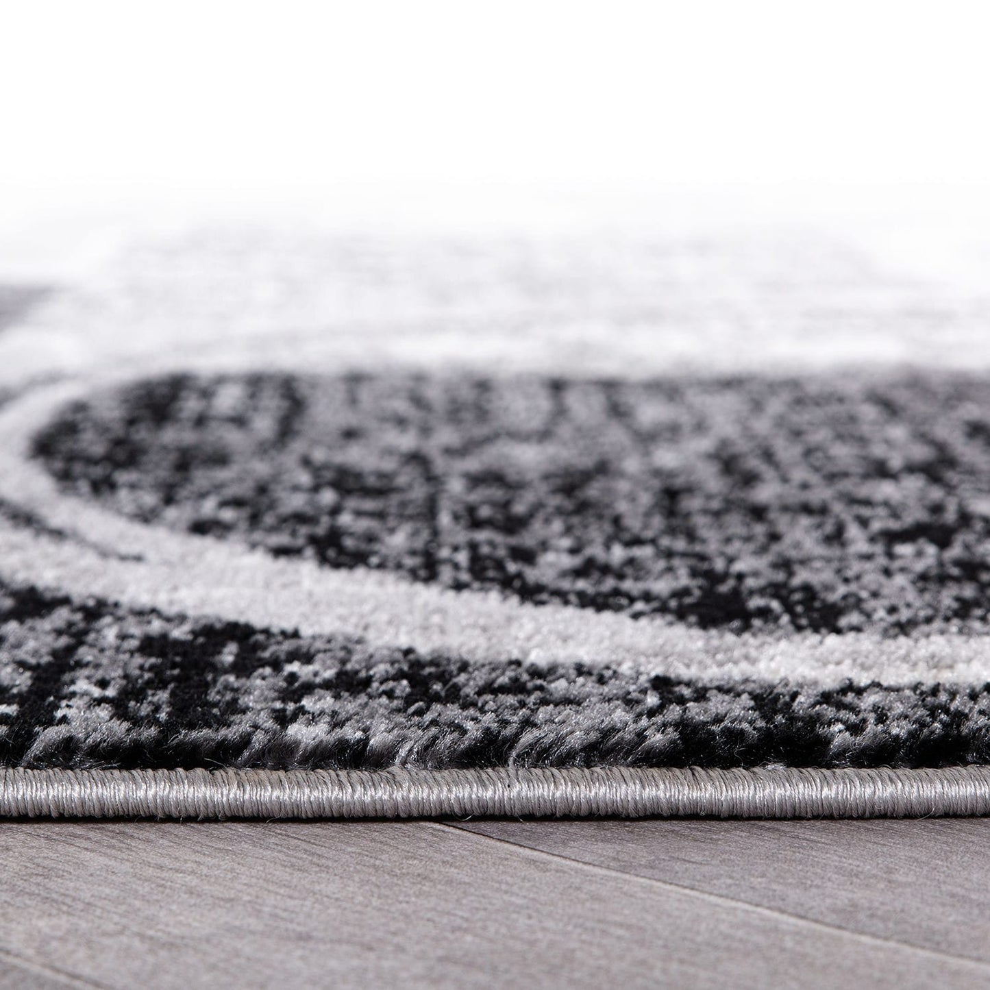 Tapis rond abstrait en polypropylène fabriqué à la machine par World Rug Gallery