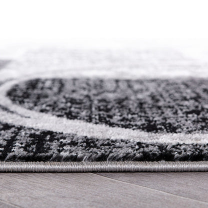 Tapis rond abstrait en polypropylène fabriqué à la machine par World Rug Gallery