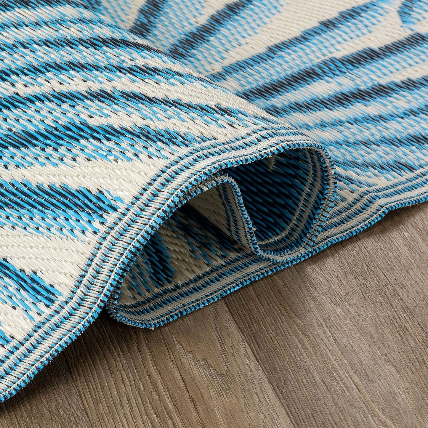 Tapis d'extérieur réversibles en plastique recyclé à motif floral tropical de World Rug Gallery